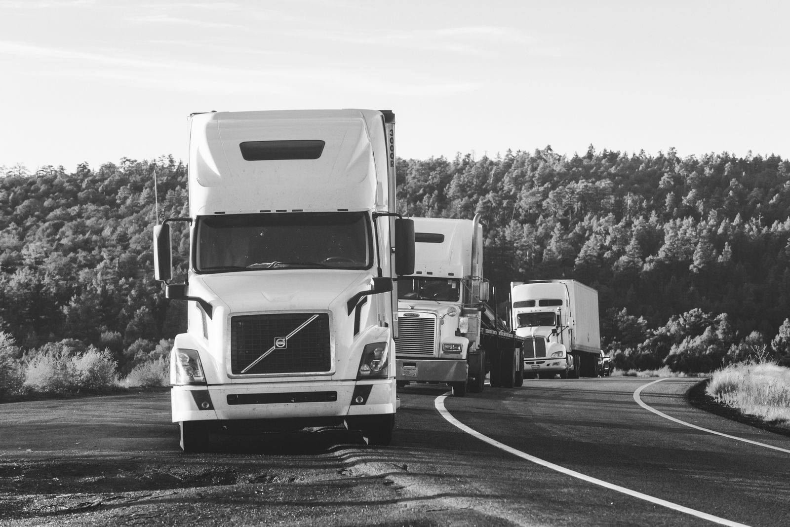 Haulage trucks on an open highway