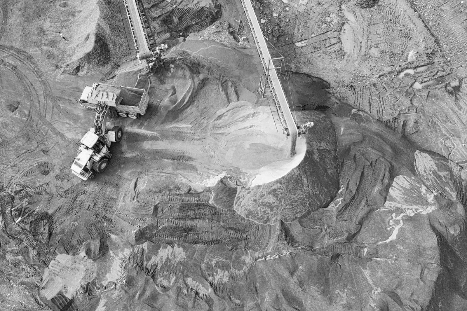 Open-pit mining operation with excavators and haul trucks